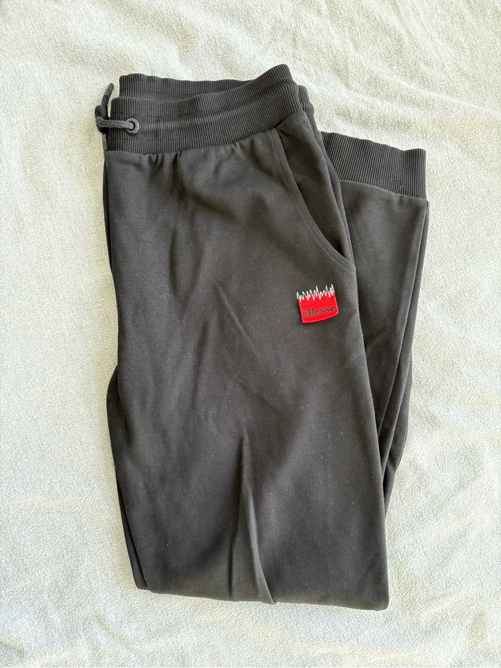 Ellesse Black Joggers with Red Logo Patch